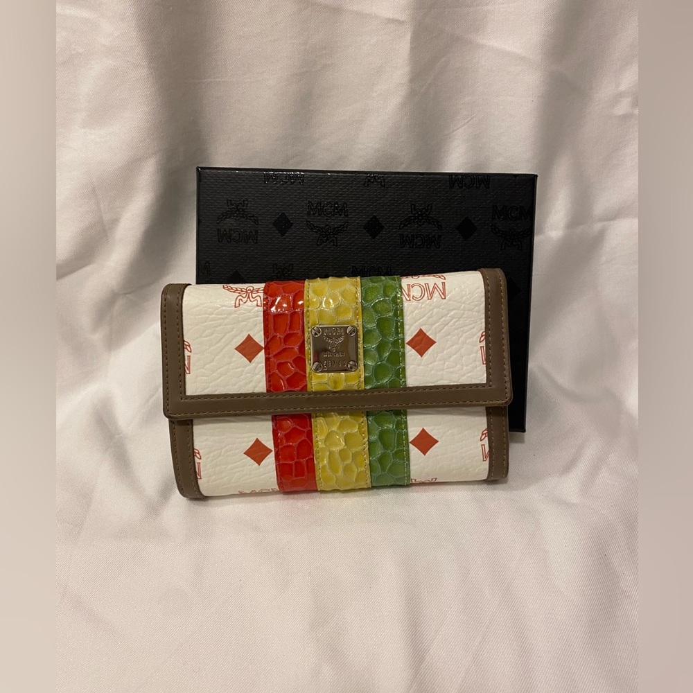 MCM wallet with box in Dad’s bag
